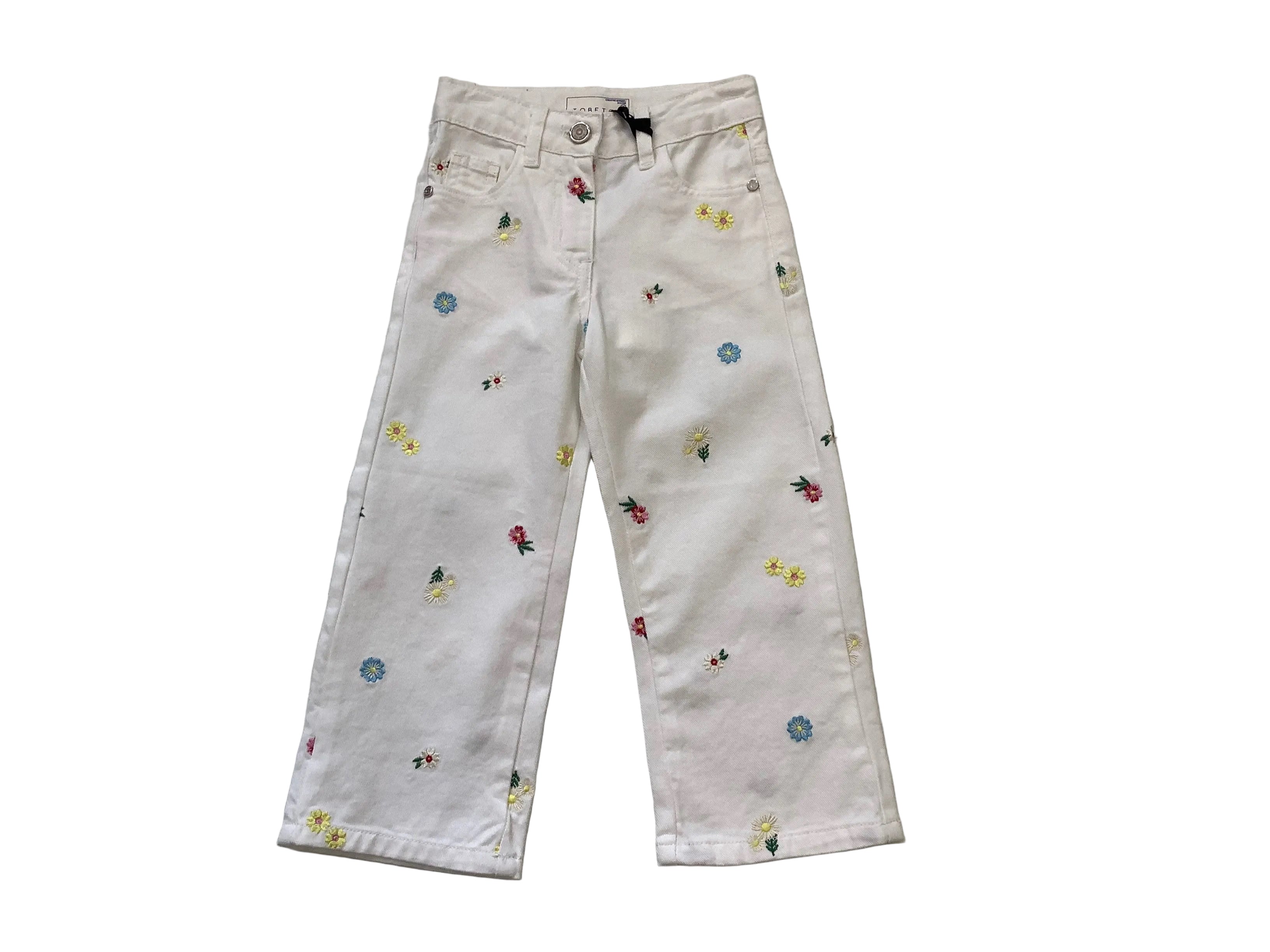 Pantalone bambina in jeans bianco ricamato. Tobetoo